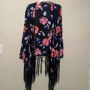Torrid size 0 fringed shrug